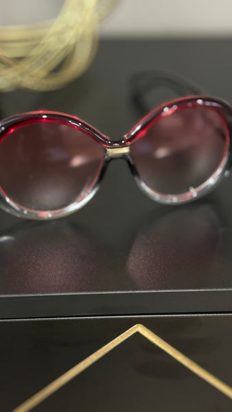 Rose red bold face black rim glasses. Funky, bold yet sexy, clean look