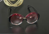 Rose red bold face black rim glasses. Funky, bold yet sexy, clean look